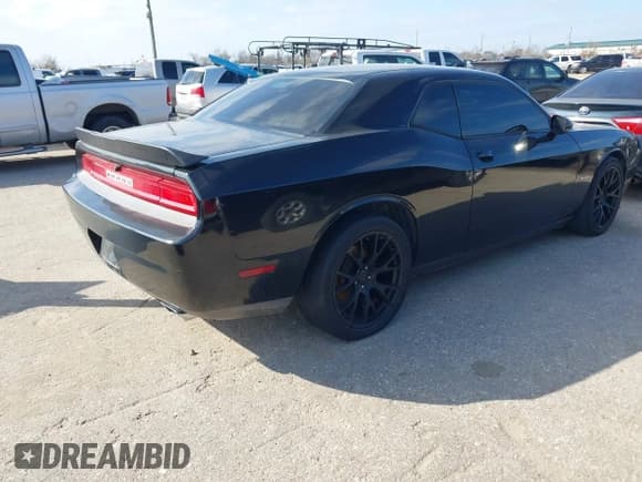 ✅ 2014 Dodge Challenger SXT • VIN: 2C3CDYAG4EH233706 • Lot: 41616549. Wystawiony na IAAI z przebiegiem 228 200 mil. Bezpłatny archiwum sprzedaży aukcyjnych z USA i szczegółowy raport historii pojazdu na DreamBid. Zdjęcie 4.