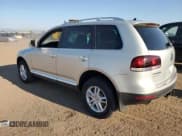 ✅ 2010 Volkswagen Touareg V6 • VIN: WVGFK7A97AD003039 • Lot: 68867865. Listed on Copart with 185,353 mi. Free auction sales archive from the USA and detailed vehicle history report at DreamBid. Image 2.