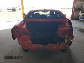 ✅ 2022 Dodge Challenger SRT Hellcat Redeye Widebody • VIN: 2C3CDZL99NH242003 • Lot: 38351624. Wystawiony na Copart z przebiegiem 6 876 mil. Bezpłatny archiwum sprzedaży aukcyjnych z USA i szczegółowy raport historii pojazdu na DreamBid. Zdjęcie 6.