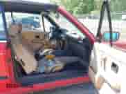 1992 BMW 3 Series z VIN WBABB2314NEC28869, wystawiony jako IAAI lot #42132873 z przebiegiem 129 436 mil mil oraz . Historia ofert i sprzedaży dostępna na DreamBid. Obrazek 5.