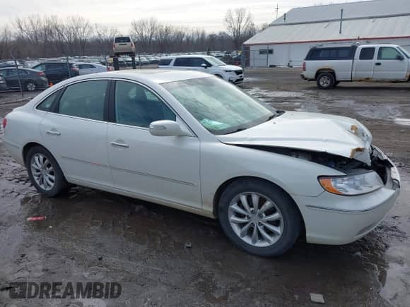 2007 Hyundai Azera SE z VIN KMHFC46F57A178118, wystawiony jako IAAI lot #41653806 z przebiegiem 104 221 mil mil oraz . Historia ofert i sprzedaży dostępna na DreamBid. Obrazek 1.