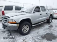 ✅ 2004 Dodge Dakota SLT • VIN: 1D7HG48N34S665027 • Lot: 41395509. Wystawiony na IAAI z przebiegiem 128 064 mil. Bezpłatny archiwum sprzedaży aukcyjnych z USA i szczegółowy raport historii pojazdu na DreamBid. Zdjęcie 17.