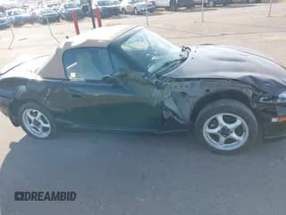 ✅ 1999 Mazda MX-5 Miata • VIN: JM1NB3533X0131941 • Lot: 43544866. Wystawiony na IAAI z przebiegiem 70 829 mil. Bezpłatny archiwum sprzedaży aukcyjnych z USA i szczegółowy raport historii pojazdu na DreamBid. Zdjęcie 6.