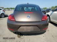 ✅ 2013 Volkswagen Beetle Fender Edition • VIN: 3VWJP7AT5DM654574 • Лот: 57112805. Опубликован ранее на Copart с пробегом 95 635 миль. Бесплатный доступ к архиву аукционных продаж из США и подробный отчёт об истории автомобиля на DreamBid. Изображение 6.