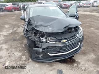 ✅ 2018 Chevrolet Cruze Premier • VIN: 1G1BF5SM1J7141701 • Lot: 43449111. Listed on IAAI with 128,825 mi. Free auction sales archive from the USA and detailed vehicle history report at DreamBid. Image 6.