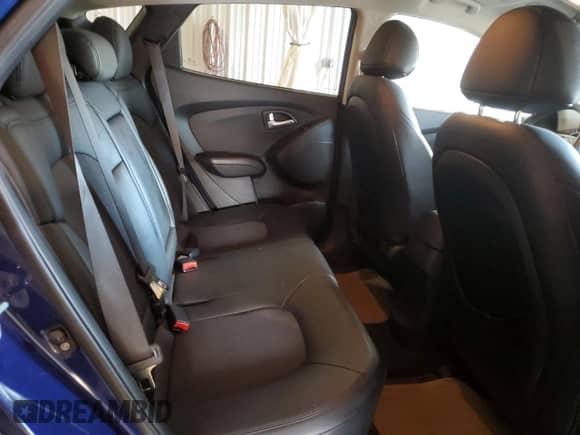 2012 Hyundai Tucson GLS z VIN KM8JU3AC4CU522240, wystawiony jako Copart lot #62401824 z przebiegiem 48 260 mil mil oraz Szkoda całkowita • Salvage title. Historia ofert i sprzedaży dostępna na DreamBid. Obrazek 11.