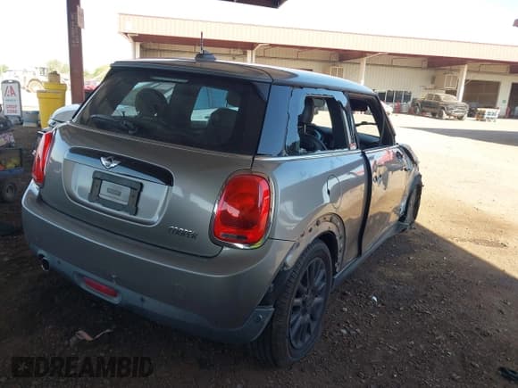 ✅ 2018 MINI Hardtop Cooper • VIN: WMWXP5C52J3D02002 • Lot: 42626931. Listed on IAAI with 86,263 mi. Free auction sales archive from the USA and detailed vehicle history report at DreamBid. Image 4.