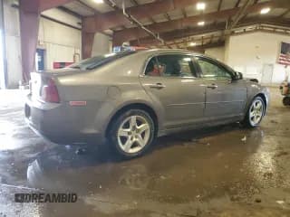 ✅ 2012 Chevrolet Malibu 1LS • VIN: 1G1ZB5E04CF241870 • Lot: 74469904. Listed on Copart with 141,239 mi. Free auction sales archive from the USA and detailed vehicle history report at DreamBid. Image 3.