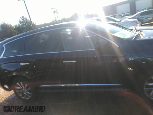 ✅ 2015 Infiniti QX60 • VIN: 5N1AL0MM7FC509109 • Lot: 41153399. Listed on IAAI with 104,652 mi. Free auction sales archive from the USA and detailed vehicle history report at DreamBid. Image 14.