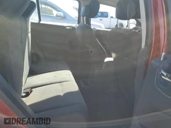 ✅ 2010 Dodge Caliber SXT • VIN: 1B3CB4HA5AD613982 • Лот: 76818044. Опубликован ранее на Copart с пробегом 165 797 миль. Бесплатный доступ к архиву аукционных продаж из США и подробный отчёт об истории автомобиля на DreamBid. Изображение 11.