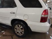 ✅ 2003 Acura MDX Touring • VIN: 2HNYD187X3H502233 • Lot: 41863001. Wystawiony na IAAI z przebiegiem 237 656 mil. Bezpłatny archiwum sprzedaży aukcyjnych z USA i szczegółowy raport historii pojazdu na DreamBid. Zdjęcie 6.