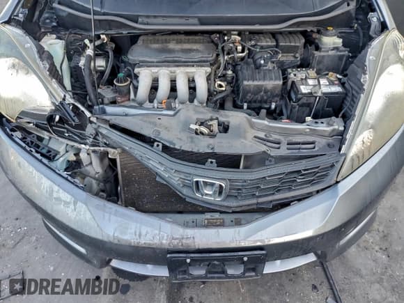 ✅ 2013 Honda Fit Sport • VIN: JHMGE8H54DC006093 • Lot: 93458655. Listed on Copart with 108,991 mi. Free auction sales archive from the USA and detailed vehicle history report at DreamBid. Image 11.