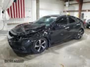 ✅ 2017 Honda Civic Touring • VIN: 19XFC1F90HE209402 • Lot: 91588855. Listed on Copart with 96,449 mi. Free auction sales archive from the USA and detailed vehicle history report at DreamBid. Image 1.