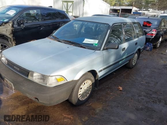 ✅ 1990 Toyota Corolla • VIN: JT2AE94K5L3375304 • Lot: 43883185. Listed on IAAI with 181,744 mi. Free auction sales archive from the USA and detailed vehicle history report at DreamBid. Image 2.