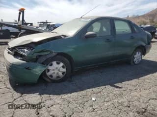 ✅ 2000 Ford Focus LX • VIN: 1FAFP33P3YW215712 • Lot: 72036905. Listed on Copart with 117,676 mi. Free auction sales archive from the USA and detailed vehicle history report at DreamBid. Image 1.