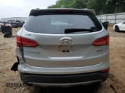 ✅ 2014 Hyundai Santa Fe • VIN: 5XYZU3LB7EG206492 • Лот: 69850035. Опубликован ранее на Copart с пробегом Не указан. Бесплатный доступ к архиву аукционных продаж из США и подробный отчёт об истории автомобиля на DreamBid. Изображение 6.