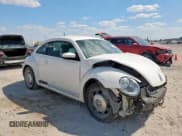 ✅ 2012 Volkswagen Beetle 2.5L • VIN: 3VWJX7AT0CM633050 • Lot: 81469485. Listed on Copart with 100,970 mi. Free auction sales archive from the USA and detailed vehicle history report at DreamBid. Image 4.