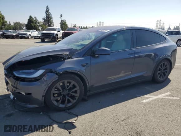 ✅ 2022 Tesla Model X • VIN: 7SAXCAE59NF345748 • Lot: 84267705. Wystawiony na Copart z przebiegiem 49 398 mil. Bezpłatny archiwum sprzedaży aukcyjnych z USA i szczegółowy raport historii pojazdu na DreamBid. Zdjęcie 1.