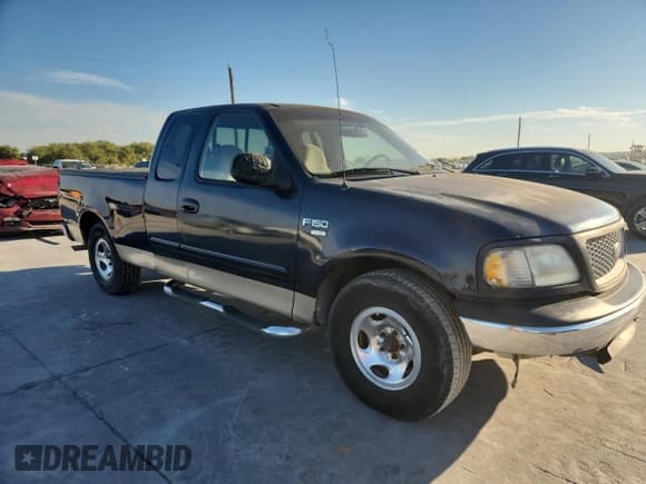 ✅ 1999 Ford F-150 • VIN: 1FTRX17W4XNB72337 • Lot: 86766575. Listed on Copart with 183,712 mi. Free auction sales archive from the USA and detailed vehicle history report at DreamBid. Image 4.