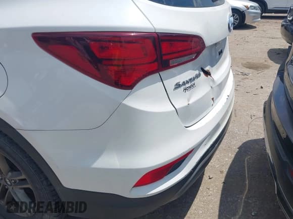✅ 2017 Hyundai Santa Fe 2.4L • VIN: 5XYZTDLB4HG399827 • Lot: 42831203. Wystawiony na IAAI z przebiegiem 173 312 mil. Bezpłatny archiwum sprzedaży aukcyjnych z USA i szczegółowy raport historii pojazdu na DreamBid. Zdjęcie 6.