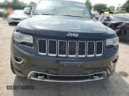 ✅ 2014 Jeep Grand Cherokee Overland • VIN: 1C4RJFCG6EC547604 • Lot: 55824944. Listed on Copart with 128,330 mi. Free auction sales archive from the USA and detailed vehicle history report at DreamBid. Image 5.