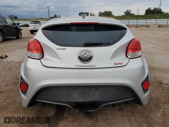 ✅ 2014 Hyundai Veloster Turbo • VIN: KMHTC6AE4EU183559 • Лот: 70338514. Размещён на Copart с пробегом 132 830 миль миль. Получите бесплатный доступ к архиву аукционных продаж из США и посмотрите подробный отчёт об истории автомобиля на DreamBid. Изображение 6.