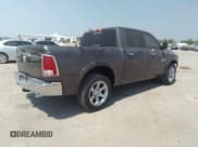 ✅ 2015 Ram 1500 Laramie • VIN: 1C6RR6NM0FS590636 • Lot: 37320388. Wystawiony na IAAI z przebiegiem 93 163 mil. Bezpłatny archiwum sprzedaży aukcyjnych z USA i szczegółowy raport historii pojazdu na DreamBid. Zdjęcie 4.