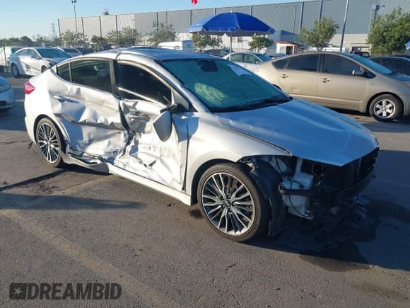 ✅ 2018 Hyundai Elantra Sport • VIN: KMHD04LB0JU588798 • Lot: 43463613. Listed on IAAI with 75,034 mi. Free auction sales archive from the USA and detailed vehicle history report at DreamBid. Image 1.