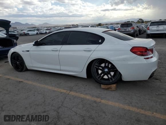 ✅ 2014 BMW 6 Series 650i • VIN: WBA6B2C50ED129604 • Lot: 71304015. Listed on Copart with 55,978 mi. Free auction sales archive from the USA and detailed vehicle history report at DreamBid. Image 2.