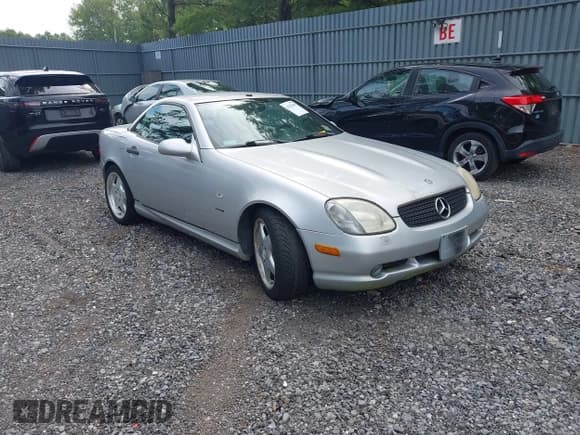 ✅ 2000 Mercedes-Benz SLK 230 Kompressor • VIN: WDBKK47F7YF167712 • Lot: 42767899. Wystawiony na IAAI z przebiegiem 61 722 mil. Bezpłatny archiwum sprzedaży aukcyjnych z USA i szczegółowy raport historii pojazdu na DreamBid. Zdjęcie 1.