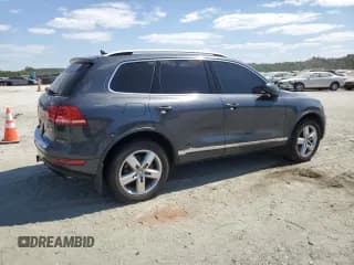 ✅ 2013 Volkswagen Touareg Sport • VIN: WVGEF9BP0DD006152 • Лот: 80262925. Опубликован ранее на Copart с пробегом Не указан. Бесплатный доступ к архиву аукционных продаж из США и подробный отчёт об истории автомобиля на DreamBid. Изображение 3.