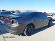 ✅ 2020 Dodge Charger SXT • VIN: 2C3CDXBG5LH249001 • Lot: 43419246. Listed on IAAI with 80,643 mi. Free auction sales archive from the USA and detailed vehicle history report at DreamBid. Image 4.