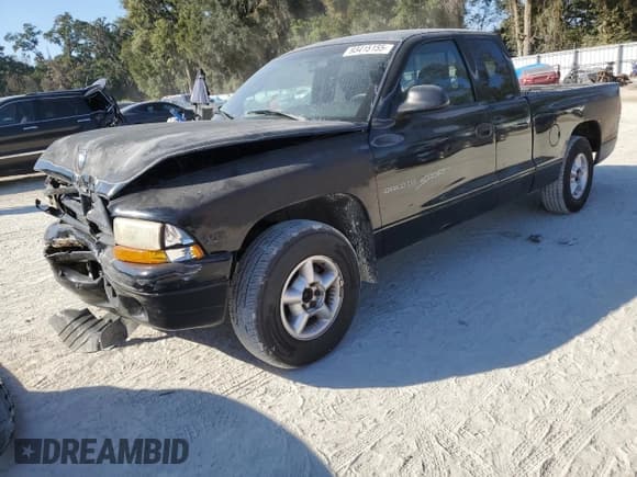 ✅ 2000 Dodge Dakota • VIN: 1B7GL22X8YS673081 • Lot: 93415155. Listed on Copart with 238,693 mi. Free auction sales archive from the USA and detailed vehicle history report at DreamBid. Image 1.