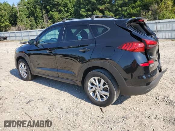 2021 Hyundai Tucson Value with VIN KM8J33A47MU407547, listed as a Copart auction lot 69693105 with 173,694 mi miles and Salvage title. Bid and sale history available at DreamBid. Image 2.