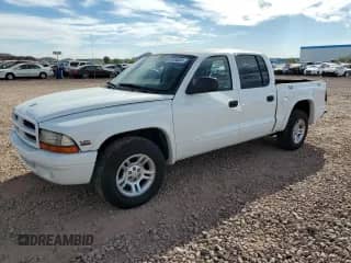 2002 Dodge Dakota Sport с VIN 1B7HL38N22S556216, выставлен на аукционе Copart как лот 81516824 с пробегом 173 992 миль миль и Списание • Salvage title. История ставок и продаж доступна на DreamBid. Изображение 1.