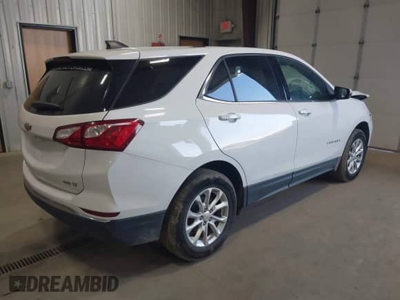 2018 Chevrolet Equinox LT with VIN 2GNAXSEV1J6238889, listed as a IAAI auction lot 43272942 with 98,674 mi miles and . Bid and sale history available at DreamBid. Image 4.