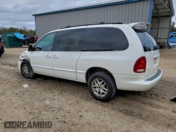 ✅ 1999 Dodge Caravan SE • VIN: 1B4GP44G1XB607352 • Lot: 94891865. Listed on Copart with 83,023 mi. Free auction sales archive from the USA and detailed vehicle history report at DreamBid. Image 2.