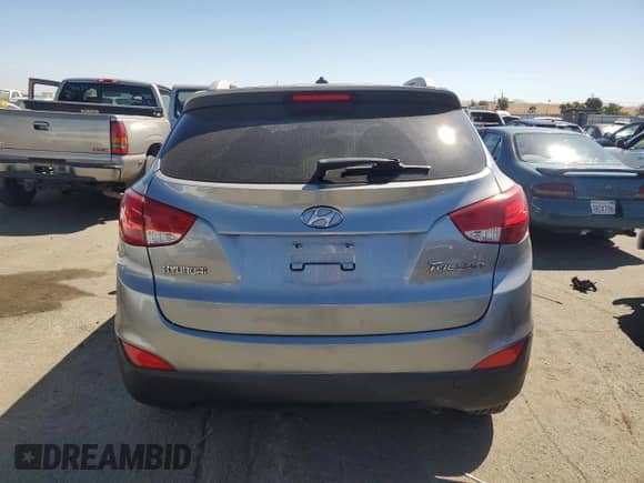 2013 Hyundai Tucson GLS z VIN KM8JU3AC6DU602057, wystawiony jako Copart lot #68757024 z przebiegiem 135 062 mil mil oraz Szkoda całkowita • Salvage title. Historia ofert i sprzedaży dostępna na DreamBid. Obrazek 6.