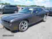 2014 Dodge Challenger SXT z VIN 2C3CDYAG3EH143382, wystawiony jako IAAI lot #43081160 z przebiegiem 35 011 mil mil oraz . Historia ofert i sprzedaży dostępna na DreamBid. Obrazek 17.