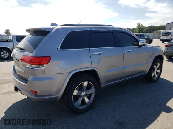 ✅ 2015 Jeep Grand Cherokee Overland • VIN: 1C4RJFCM2FC785196 • Lot: 72071175. Listed on Copart with 184,027 mi. Free auction sales archive from the USA and detailed vehicle history report at DreamBid. Image 3.