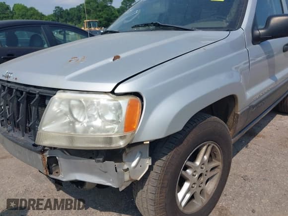 ✅ 2004 Jeep Grand Cherokee Laredo • VIN: 1J4GX48S74C165095 • Lot: 42306475. Listed on IAAI with 238,560 mi. Free auction sales archive from the USA and detailed vehicle history report at DreamBid. Image 15.