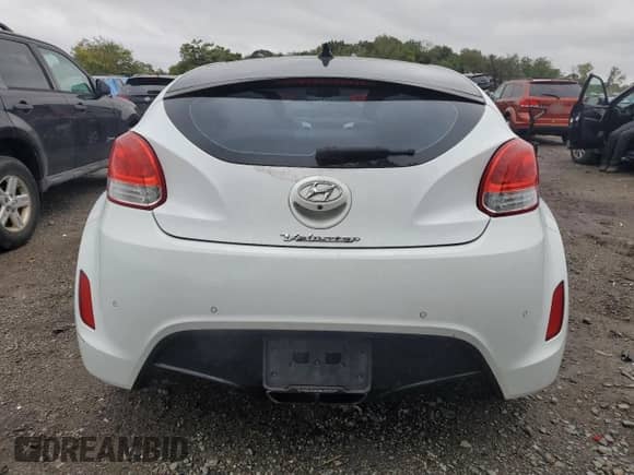2013 Hyundai Veloster w/Gray Int с VIN KMHTC6AD3DU149988, выставлен на аукционе Copart как лот 72764624 с пробегом 30 503 миль миль и Списание • Salvage title. История ставок и продаж доступна на DreamBid. Изображение 6.