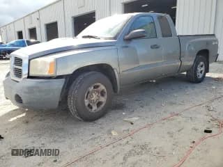 ✅ 2005 Dodge Dakota • VIN: 1D7HW22N35S220711 • Lot: 81703275. Listed on Copart with 124,156 mi. Free auction sales archive from the USA and detailed vehicle history report at DreamBid. Image 1.