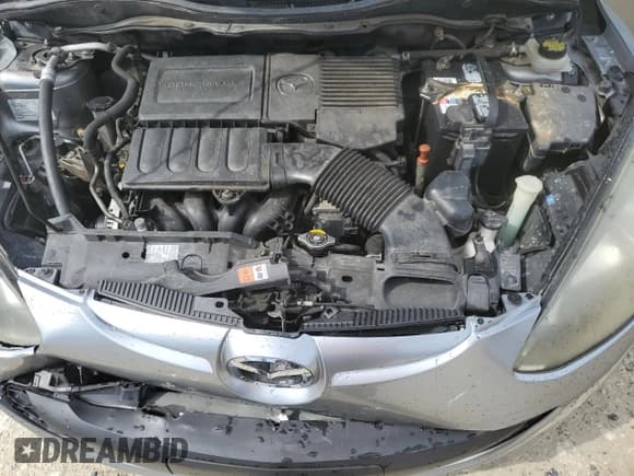 ✅ 2014 Mazda 2 Touring • VIN: JM1DE1LY3E0188563 • Лот: 68694805. Опубликован ранее на Copart с пробегом 242 641 миль. Бесплатный доступ к архиву аукционных продаж из США и подробный отчёт об истории автомобиля на DreamBid. Изображение 11.