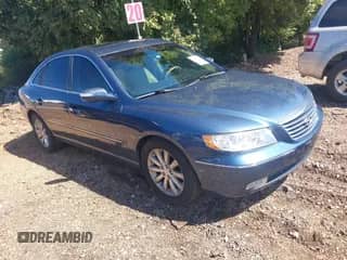 2009 Hyundai Azera Limited z VIN KMHFC46F59A360484, wystawiony jako IAAI lot #43093452 z przebiegiem 97 774 mil mil oraz . Historia ofert i sprzedaży dostępna na DreamBid. Obrazek 1.