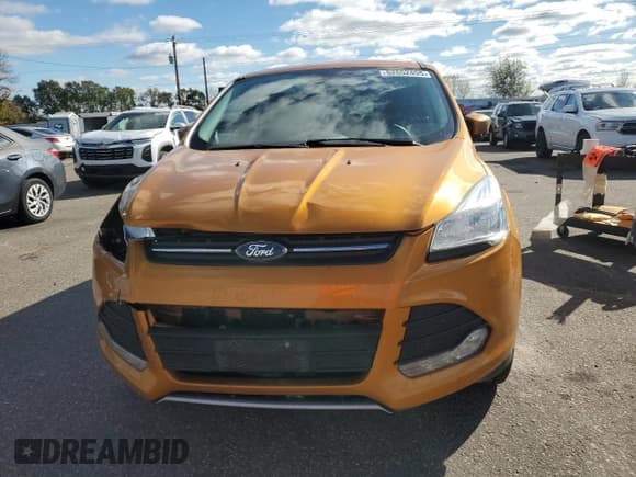✅ 2016 Ford Escape SE • VIN: 1FMCU9GX4GUB98928 • Lot: 82652455. Listed on Copart with 128,490 mi. Free auction sales archive from the USA and detailed vehicle history report at DreamBid. Image 5.
