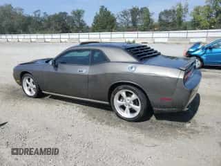 2009 Dodge Challenger R/T z VIN 2B3LJ54T09H511097, wystawiony jako Copart lot #68181824 z przebiegiem 182 596 mil mil oraz Szkoda całkowita • Salvage title. Historia ofert i sprzedaży dostępna na DreamBid. Obrazek 2.