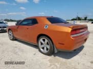 ✅ 2011 Dodge Challenger R/T • VIN: 2B3CJ5DTXBH589991 • Lot: 61130975. Listed on Copart with 206,596 mi. Free auction sales archive from the USA and detailed vehicle history report at DreamBid. Image 2.