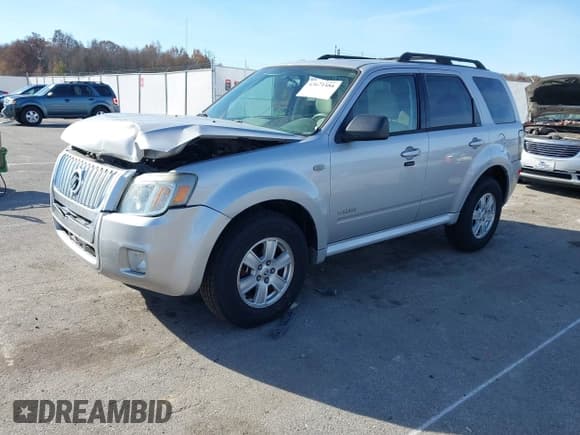 ✅ 2008 Mercury Mariner • VIN: 4M2CU81Z28KJ47086 • Lot: 43671488. Listed on IAAI with 173,091 mi. Free auction sales archive from the USA and detailed vehicle history report at DreamBid. Image 2.