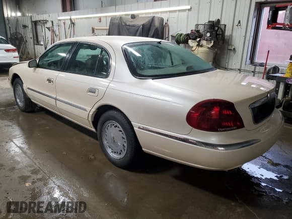✅ 1998 Lincoln Continental • VIN: 1LNFM97V9WY604317 • Lot: 83999234. Listed on Copart with 91,277 mi. Free auction sales archive from the USA and detailed vehicle history report at DreamBid. Image 2.